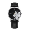Four-leaf clover watch close-up of dial