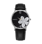 Four-leaf clover watch close-up of dial