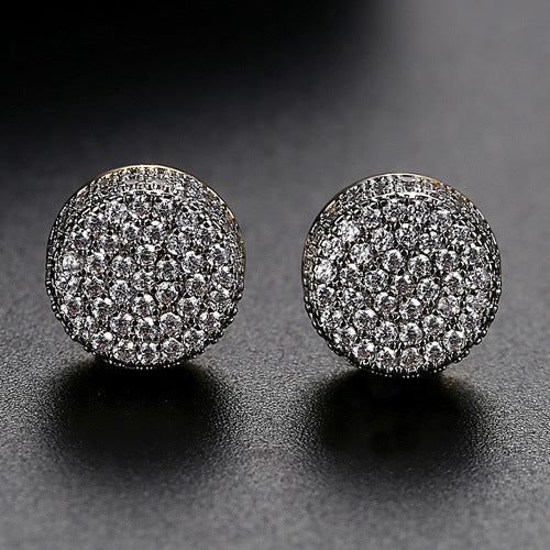 Hip hop stud earrings worn close-up