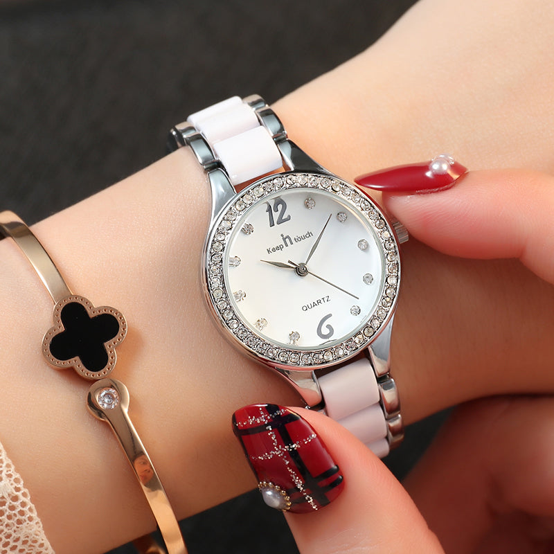 Luxury quartz watch for women, close-up of dial and strap