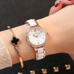 Luxury waterproof quartz watch for women in gold, front view