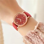 Luminous quartz watch worn on wrist
