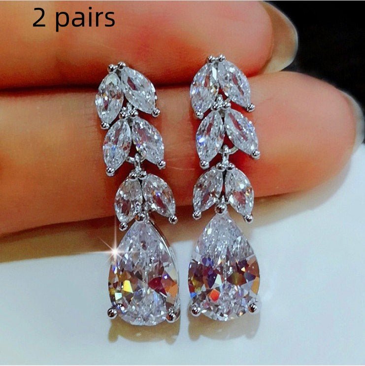 Silver big hoop earrings for women, pair on display