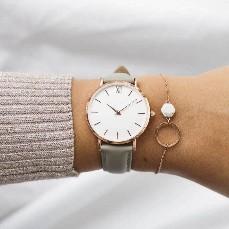 Large dial leather watch worn on wrist