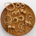 Sweet pearl and alloy geometric earring set, front view