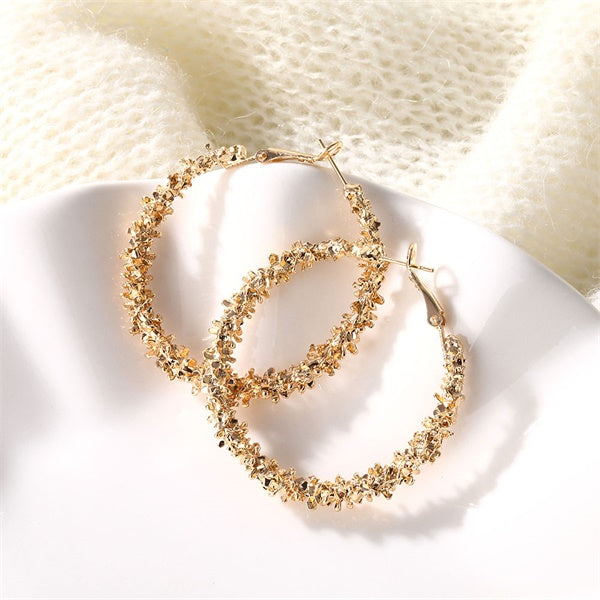 Pearl and gold hoop earrings, packaging shot