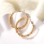Pearl and gold hoop earrings, packaging shot