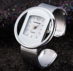 Luxury bracelet cuff watch, styled with outfit