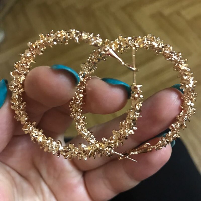 Pearl and gold hoop earrings, styled with outfit