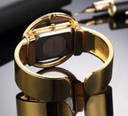 Luxury bracelet cuff watch, gold black colourway