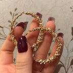 Round pearl and gold hoop earring set, front view