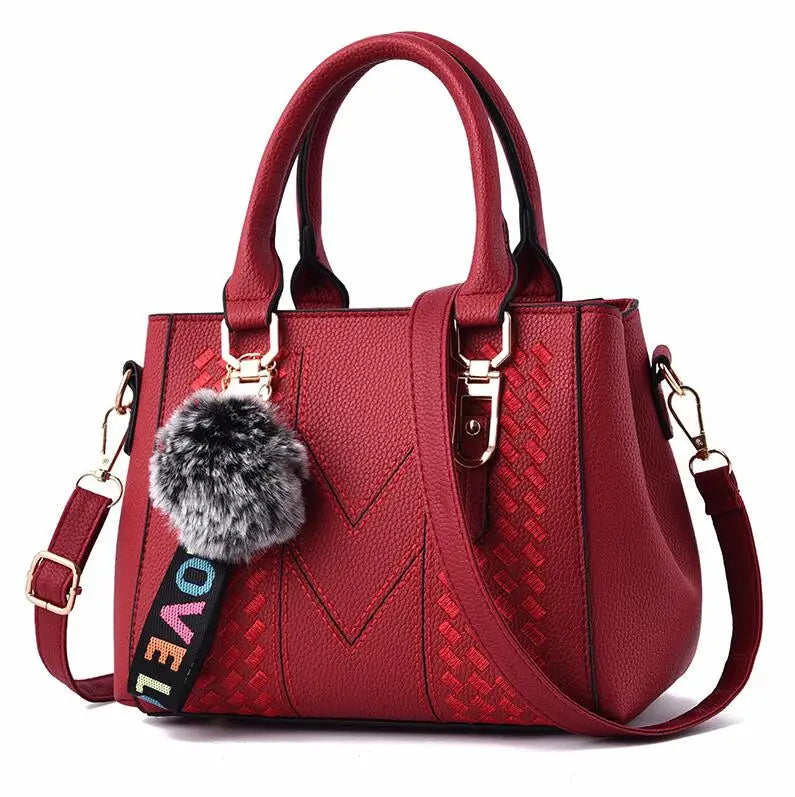 Prime Deal Zone women's leather embroidery messenger bag with handle, stylish handbag for women, featuring detailed embroidery design.