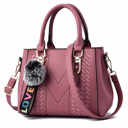 Leather embroidery messenger bag for women, stylish handbag with detailed embroidery and spacious interior, ideal for daily use.