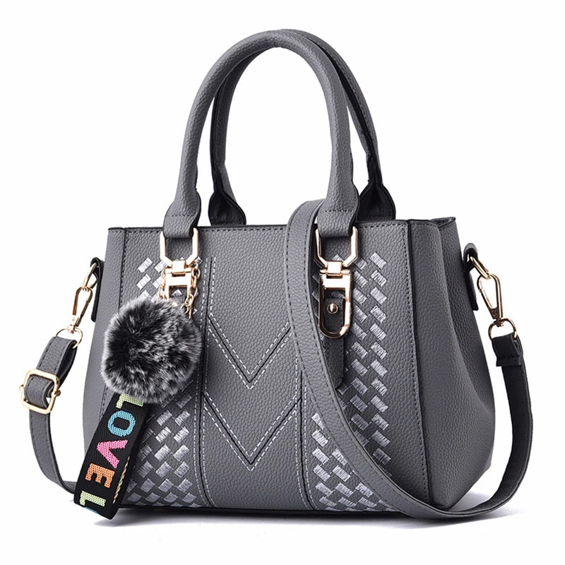Prime Deal Zone women's leather embroidery messenger bag with hand strap, stylish handbag for women featuring decorative embroidery.