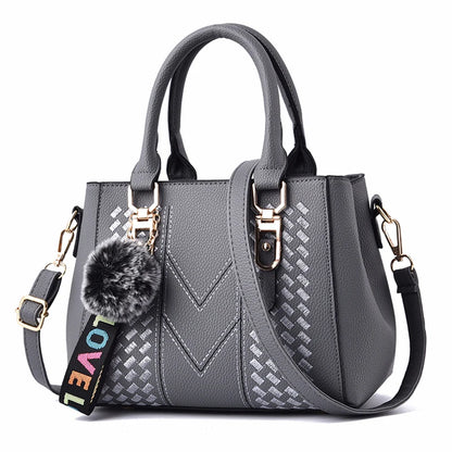 Prime Deal Zone women's leather embroidery messenger bag with hand strap, stylish handbag for women featuring decorative embroidery.