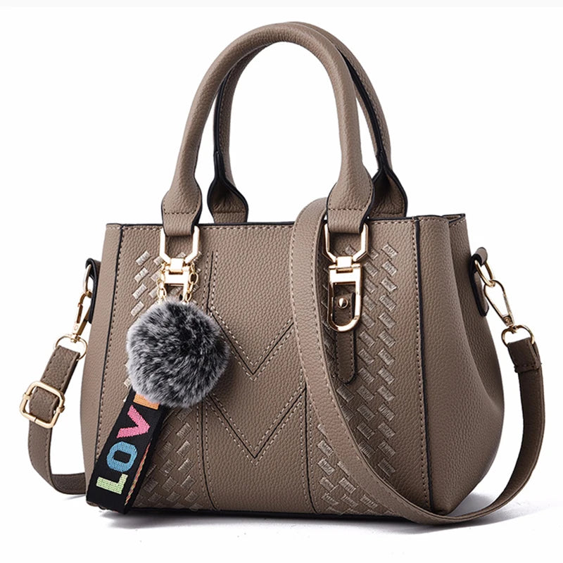 Leather embroidery messenger bag for women by Prime Deal Zone, stylish handbag with embroidery details and a top handle design.