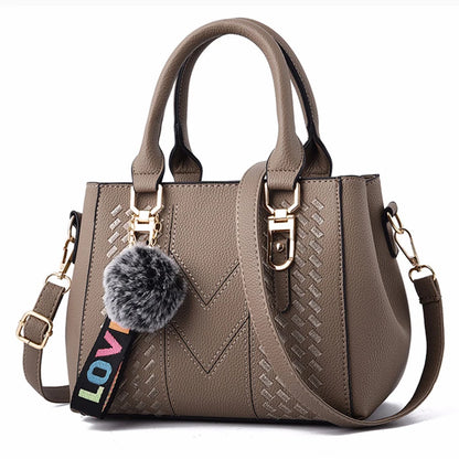 Leather embroidery messenger bag for women by Prime Deal Zone, stylish handbag with embroidery details and a top handle design.