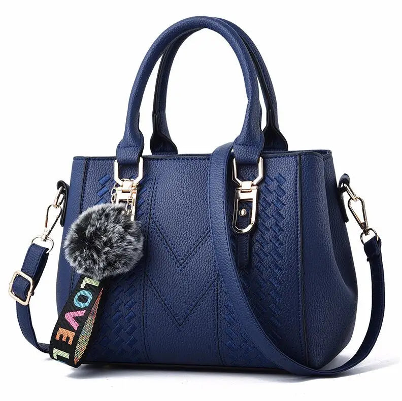 Prime Deal Zone women's leather embroidery messenger bag with a hairball design, stylish handbag for women with a main compartment.