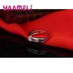 Rainbow cubic zircon ring, angled view
