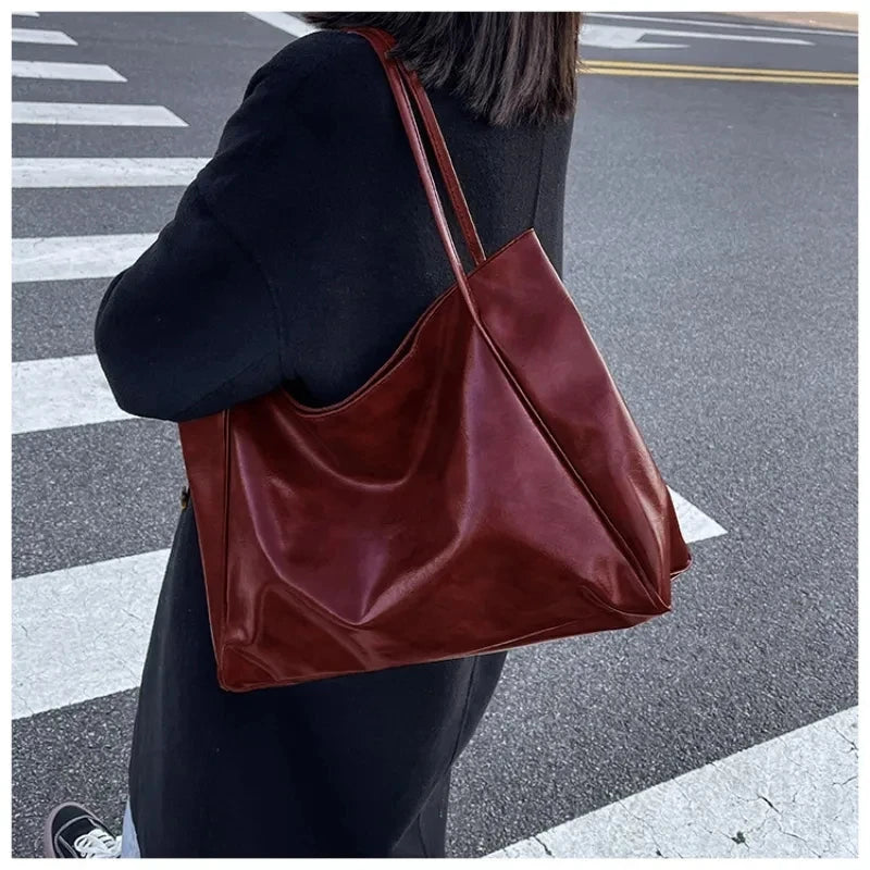 Large capacity fashion tote bag for girls by Prime Deal Zone, showing spacious design with sturdy handles and stylish appearance.