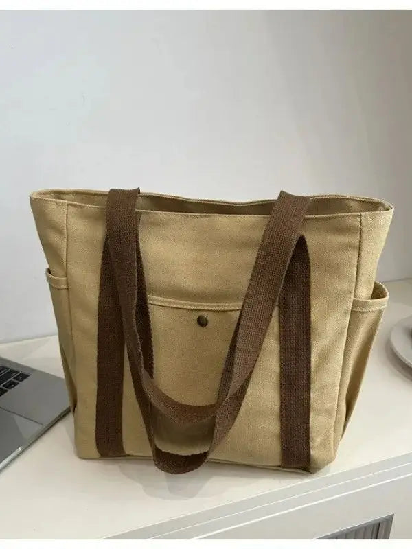 Prime Deal Zone portable large-capacity canvas shoulder bag, versatile cloth bag for students' classes and daily use.