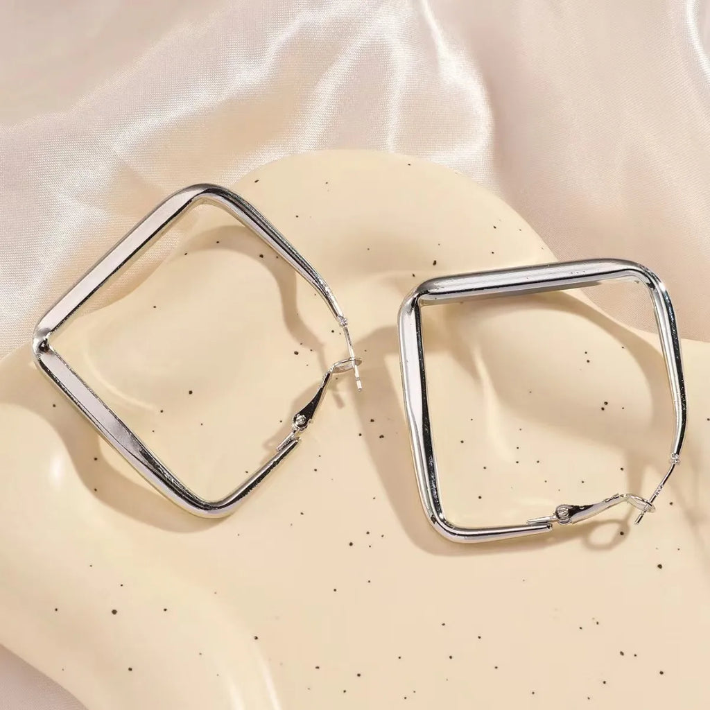Gold square hoop earrings for women featuring exaggerated geometric irregular circle design by Prime Deal Zone.