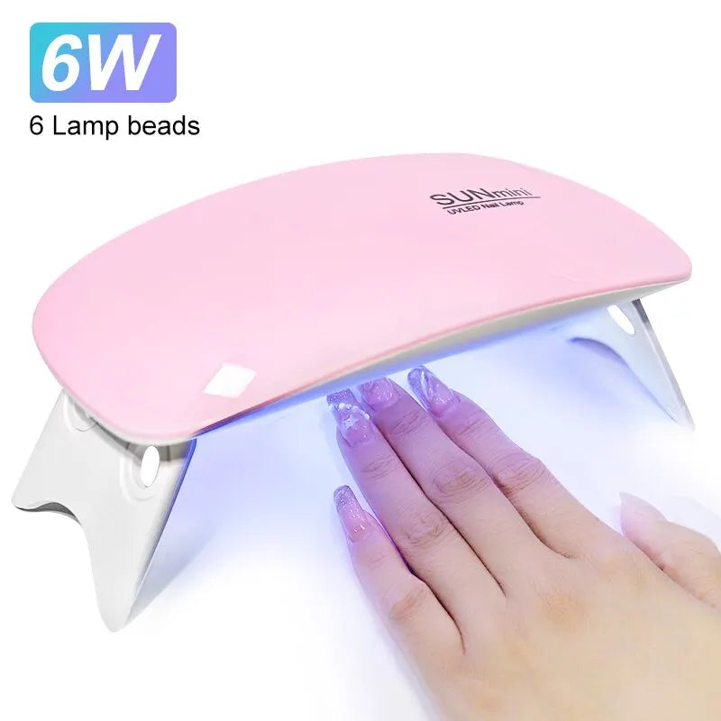 Prime Deal Zone 6W mini nail dryer with 6 LED UV lamp for quick polish drying, portable design with USB cable for home use.