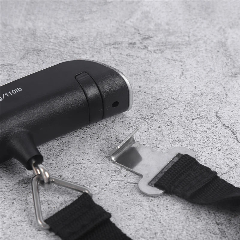 Digital portable luggage scale with LCD display showing 50kg weight, ideal for travel baggage and suitcase weighing by Prime Deal Zone.