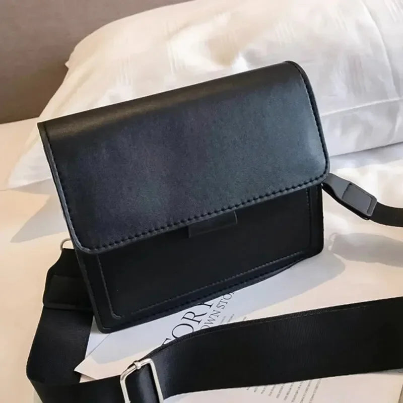 Small women's crossbody bag by Prime Deal Zone in black PU leather, featuring a compact shoulder design for travel and everyday use.