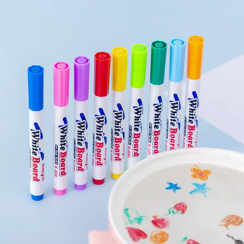 Water floating pen set for kids with colorful ink, spoon, and chalk art tools, ideal for floating water painting and graffiti drawing.