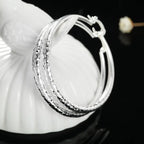 3cm circle hoop earrings styled with everyday outfit