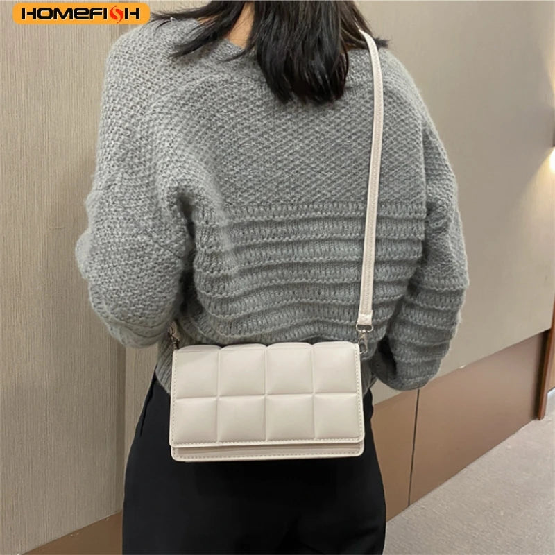 Homefish women's literary shoulder and crossbody bag with niche design, stylish black fabric with gold accents, versatile for everyday use