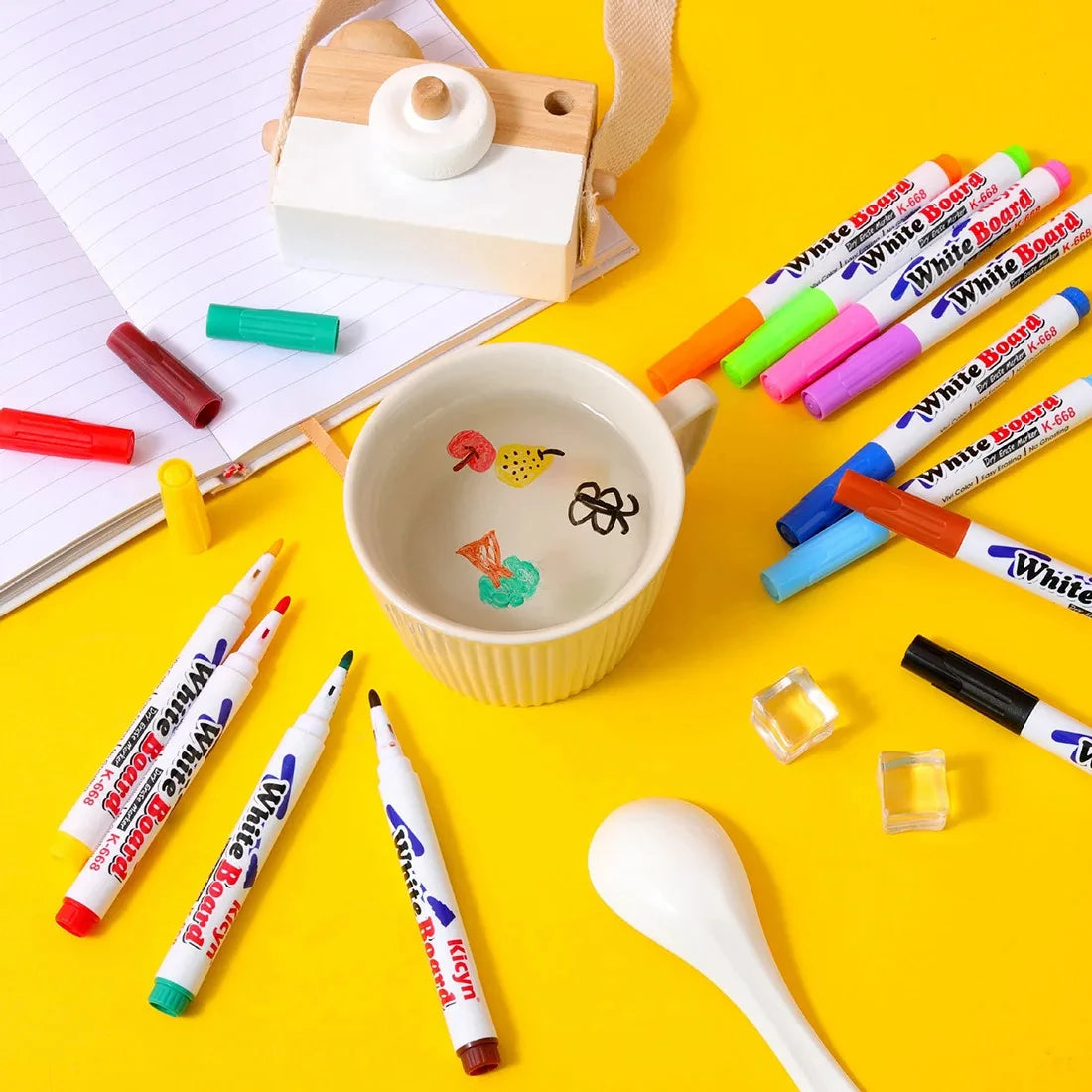 Water floating pen set with colorful ink, spoon, and chalk for kids, featuring floating water painting and graffiti art by Prime Deal Zone.
