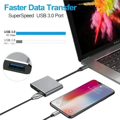 Prime Deal Zone USB C Hub 3-in-1 docking station with HDMI, USB-C, and charging port connected to a MacBook and smartphone.