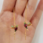 Hand-carved bird-shaped long tassel earrings for women with red and green synthetic zircon accents, featuring intricate banquet jewelry design.