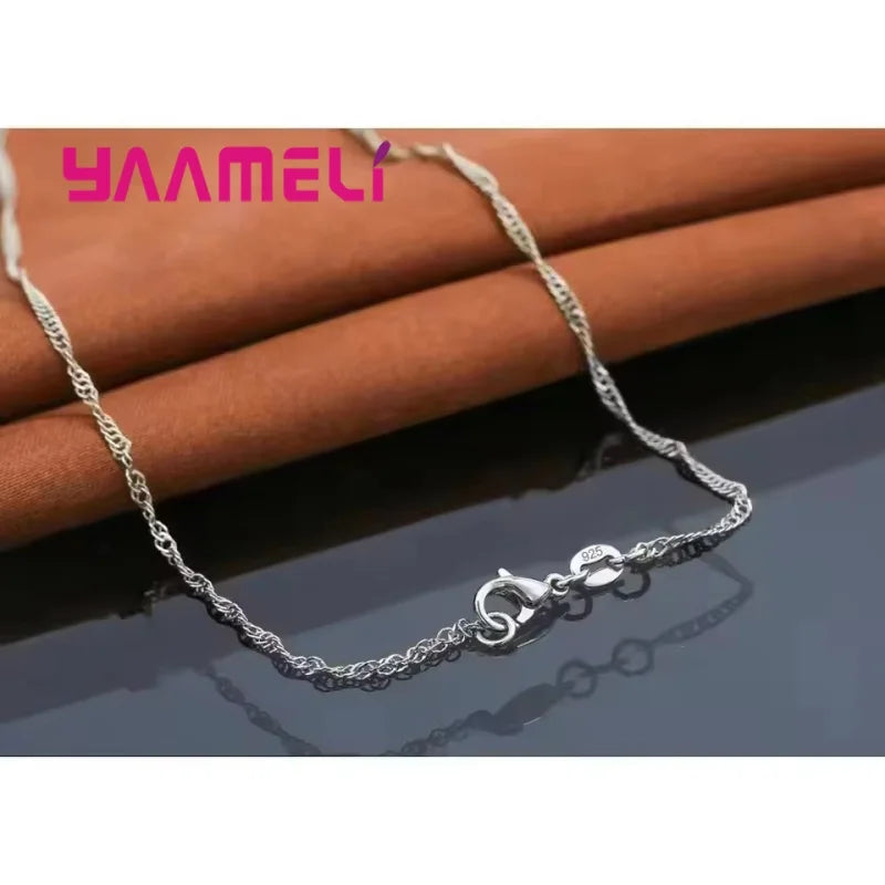 Silver heart necklace and earrings set packaging