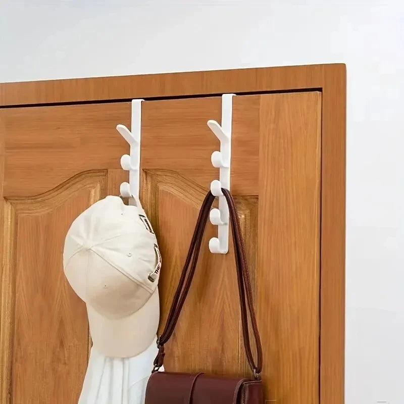 Plastic over-the-door bedroom clothes hanging rack with hooks for purses and bags, ideal for home storage organization.