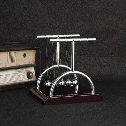 Prime Deal Zone Newton's Cradle steel ball desktop toy for physics demonstration, stress relief, and home decoration.
