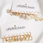 Set of 10 gold-colored creative earrings for women featuring hollowed-out butterfly and love designs, stylish jewelry gift.