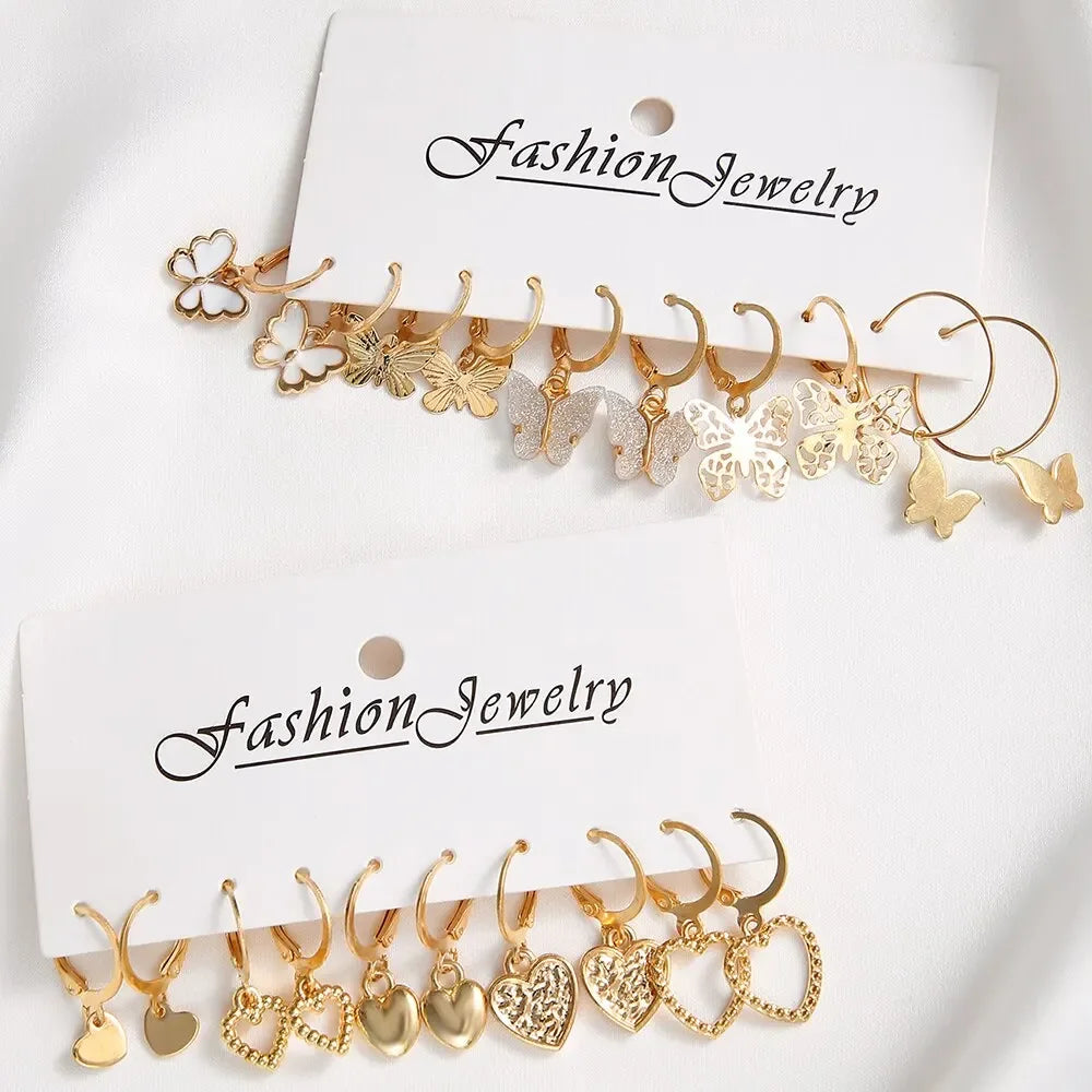 Set of 10 gold-colored creative earrings for women featuring hollowed-out butterfly and love designs, stylish jewelry gift.