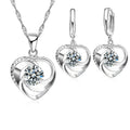 Silver heart necklace and earrings set, front view