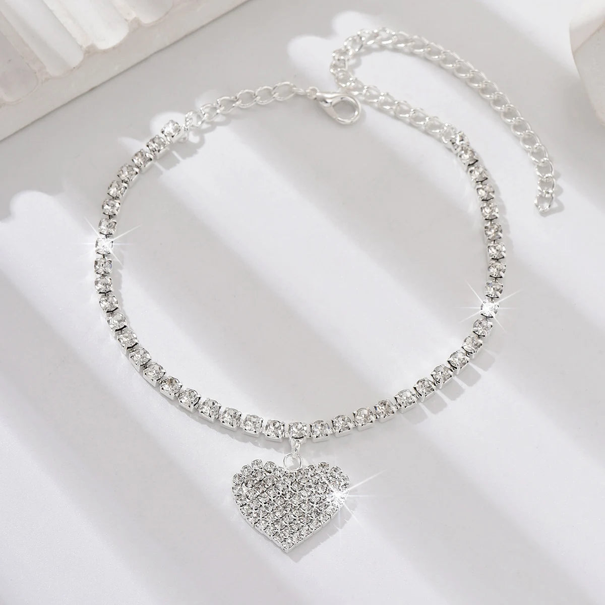 Women's copper inlaid water diamond love foot chain bracelet with delicate design, perfect for wedding or party jewelry.