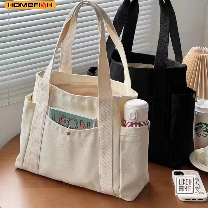 Large-capacity Prime Deal Zone HOMEFISH canvas shoulder bag, versatile bag for students' classes and daily use, with sturdy cloth material.