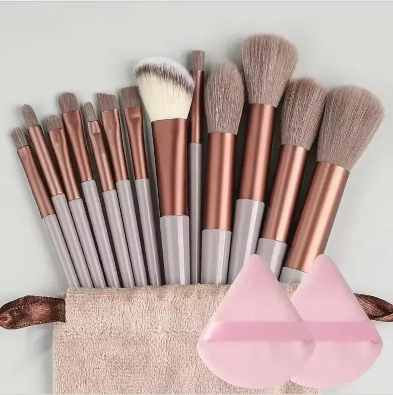 Set of 13 synthetic nylon makeup brushes in various sizes for foundation, blush, and powder application, cruelty-free and soft.