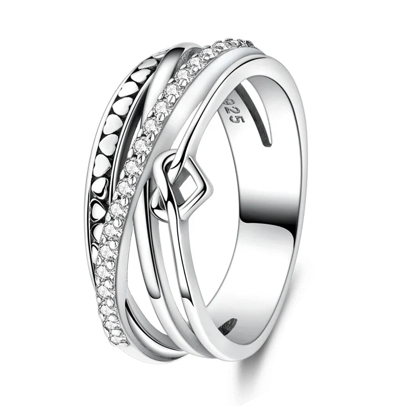 Minimalist silver zircon ring, angled view