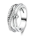 Minimalist silver zircon ring, angled view