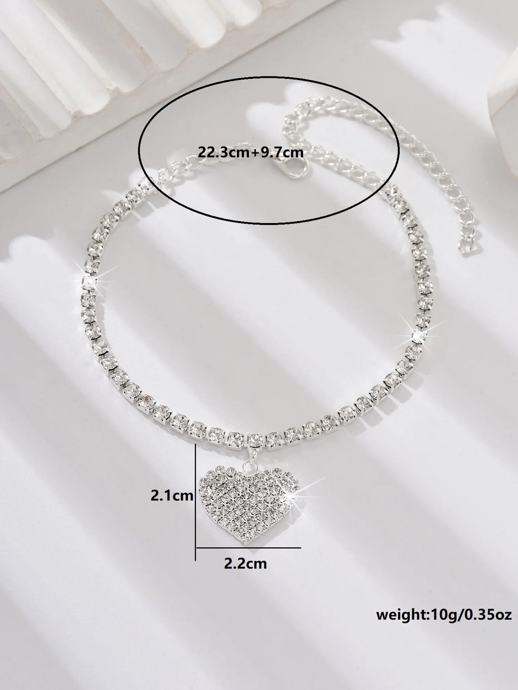 Women's copper inlaid water diamond love foot chain bracelet, elegant jewelry accessory for wedding or party occasions.