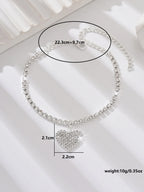 Women's copper inlaid water diamond love foot chain bracelet, elegant jewelry accessory for wedding or party occasions.