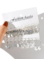 Set of 10 gold-colored creative earrings for women, featuring butterfly and hollowed-out designs, ideal for fashion and jewelry gifts.