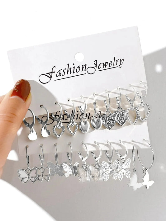 Set of 10 gold-colored creative earrings for women, featuring butterfly and hollowed-out designs, ideal for fashion and jewelry gifts.